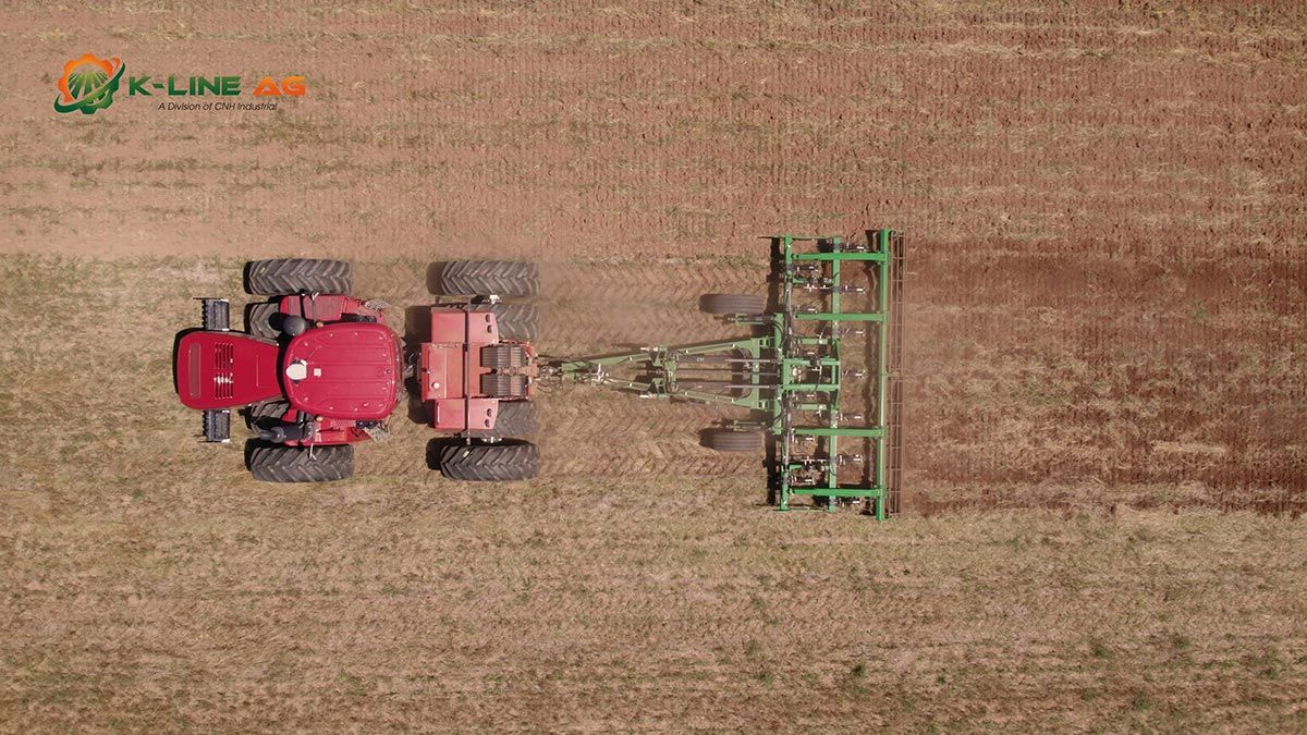 Overhead view of the ThunderRipper being towed behind a red tractor